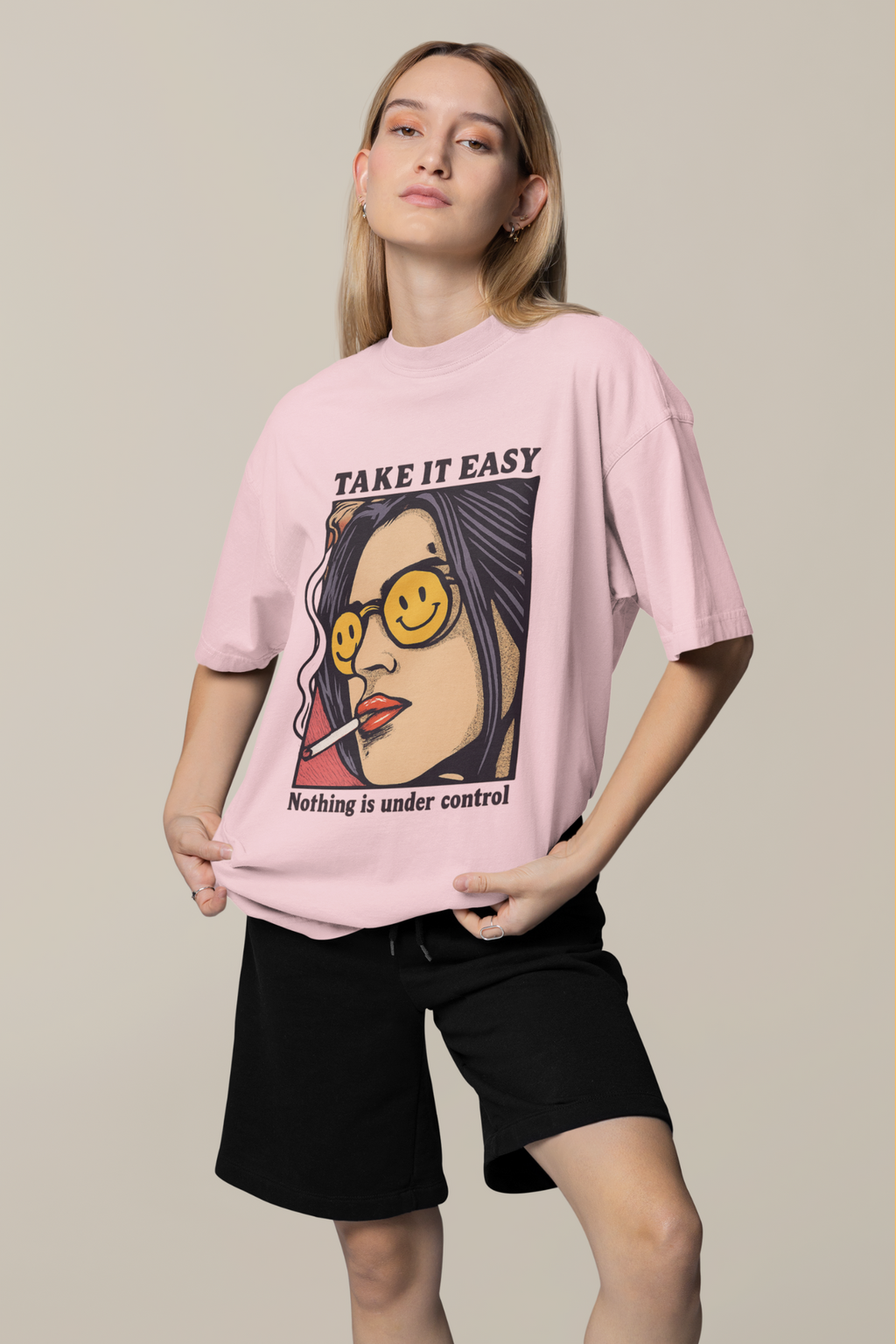 light pink oversized T-shirt with a graphic design