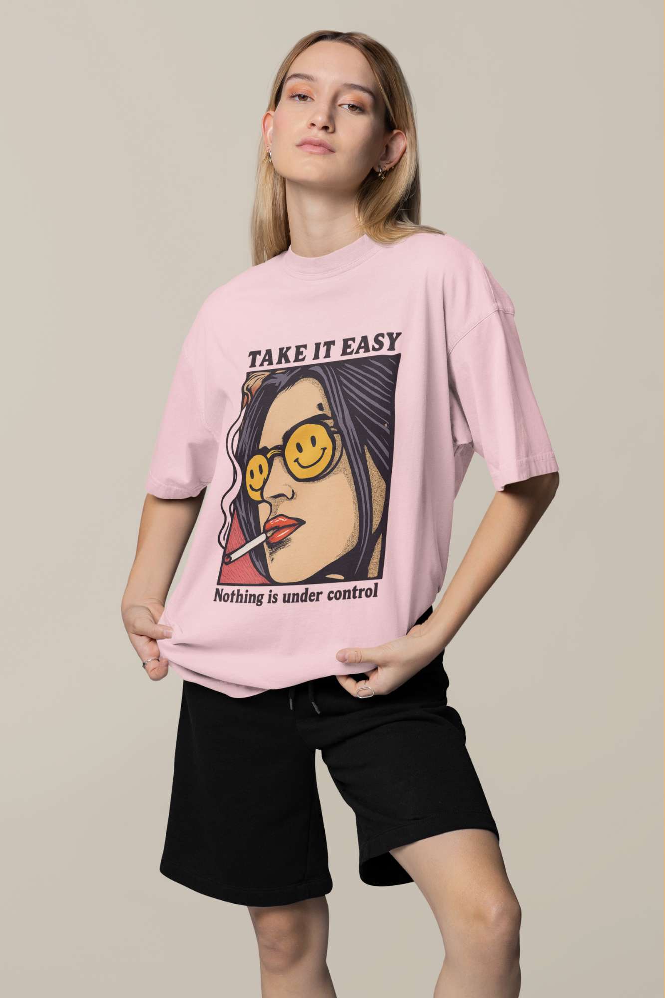 light pink oversized T-shirt with a graphic design