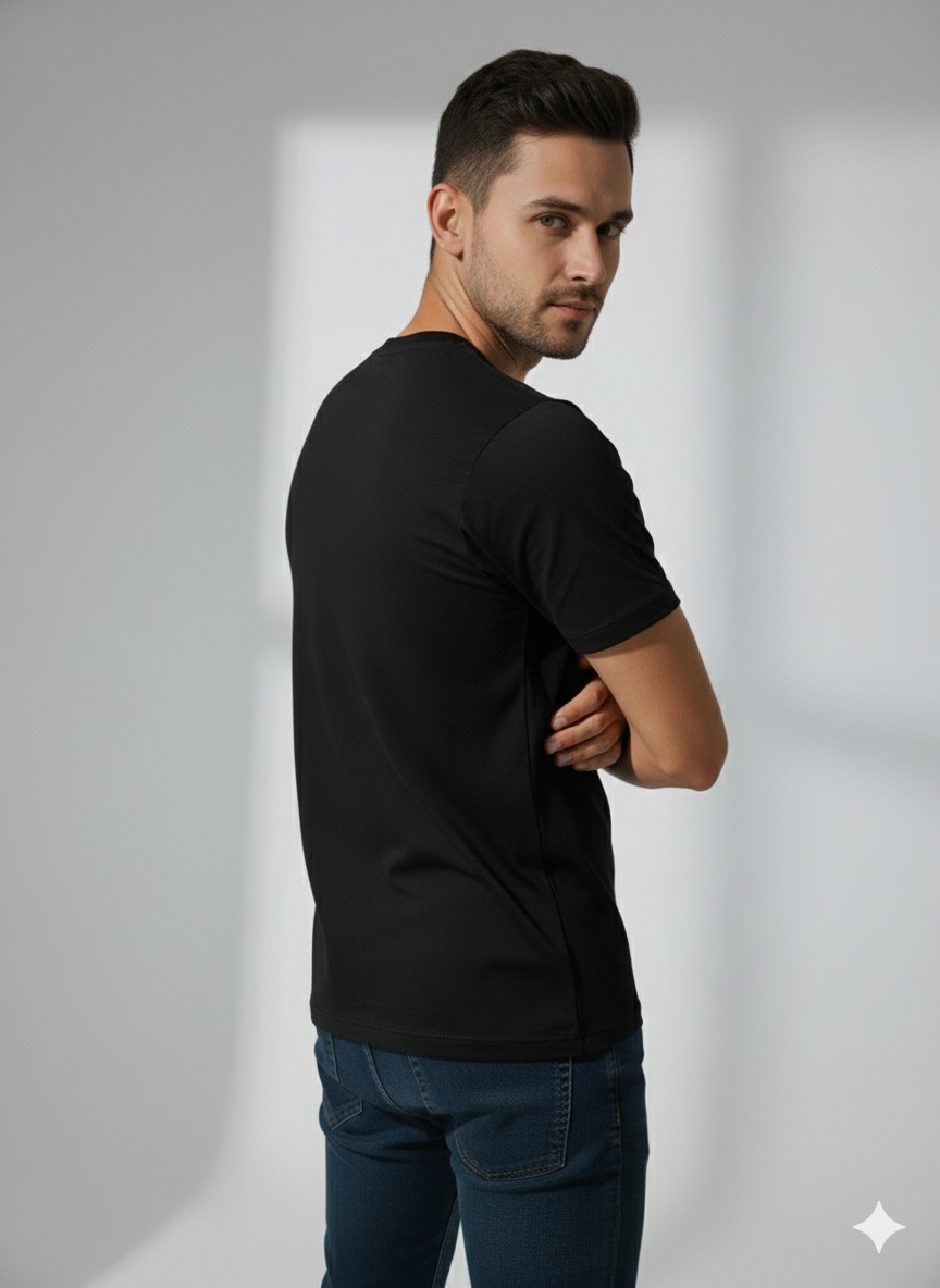 Men's black round neck t-shirt with graphic print and text "THE WAY", styled with denim jeans.