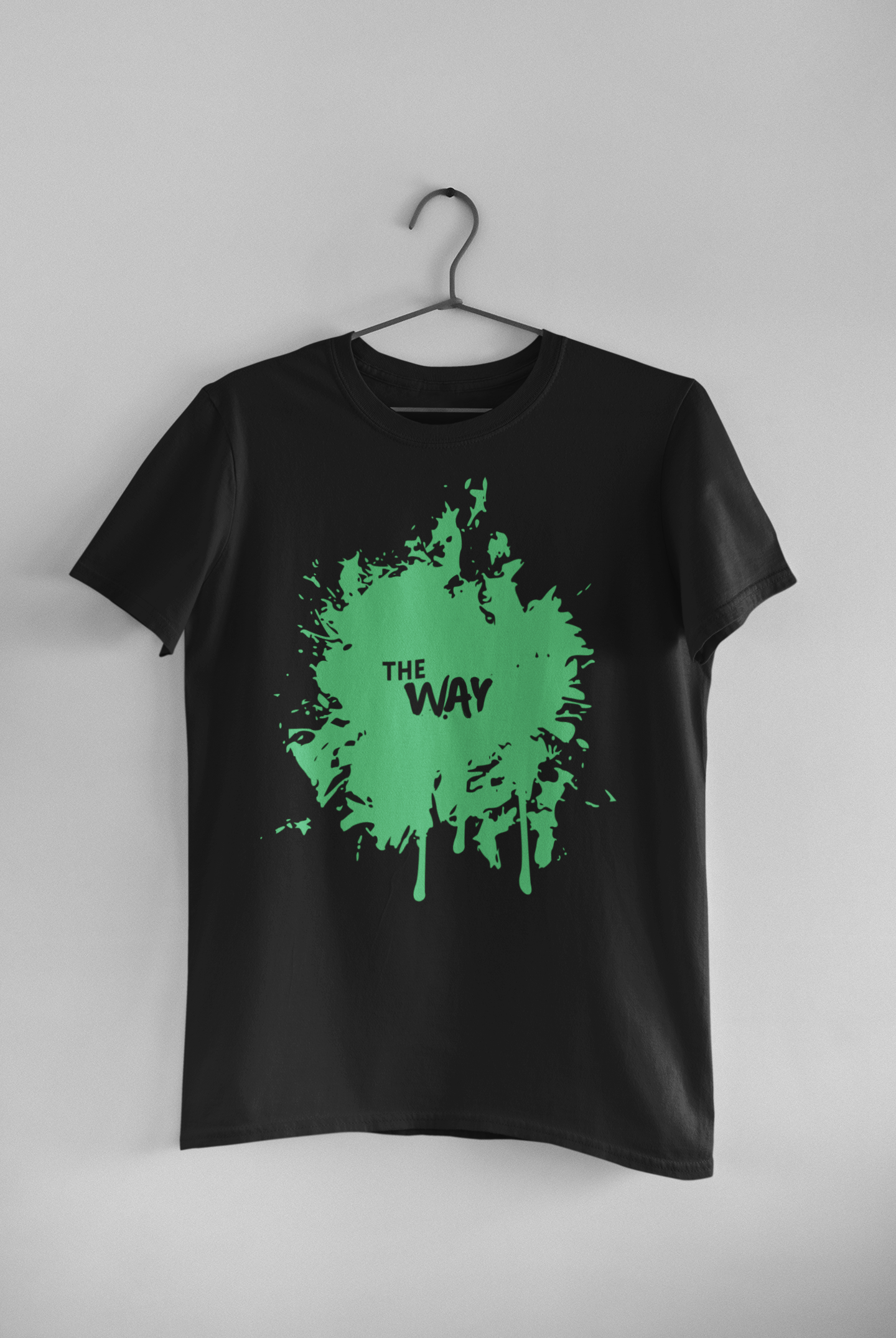 Men's black round neck t-shirt with graphic print and text "THE WAY", styled with denim jeans.