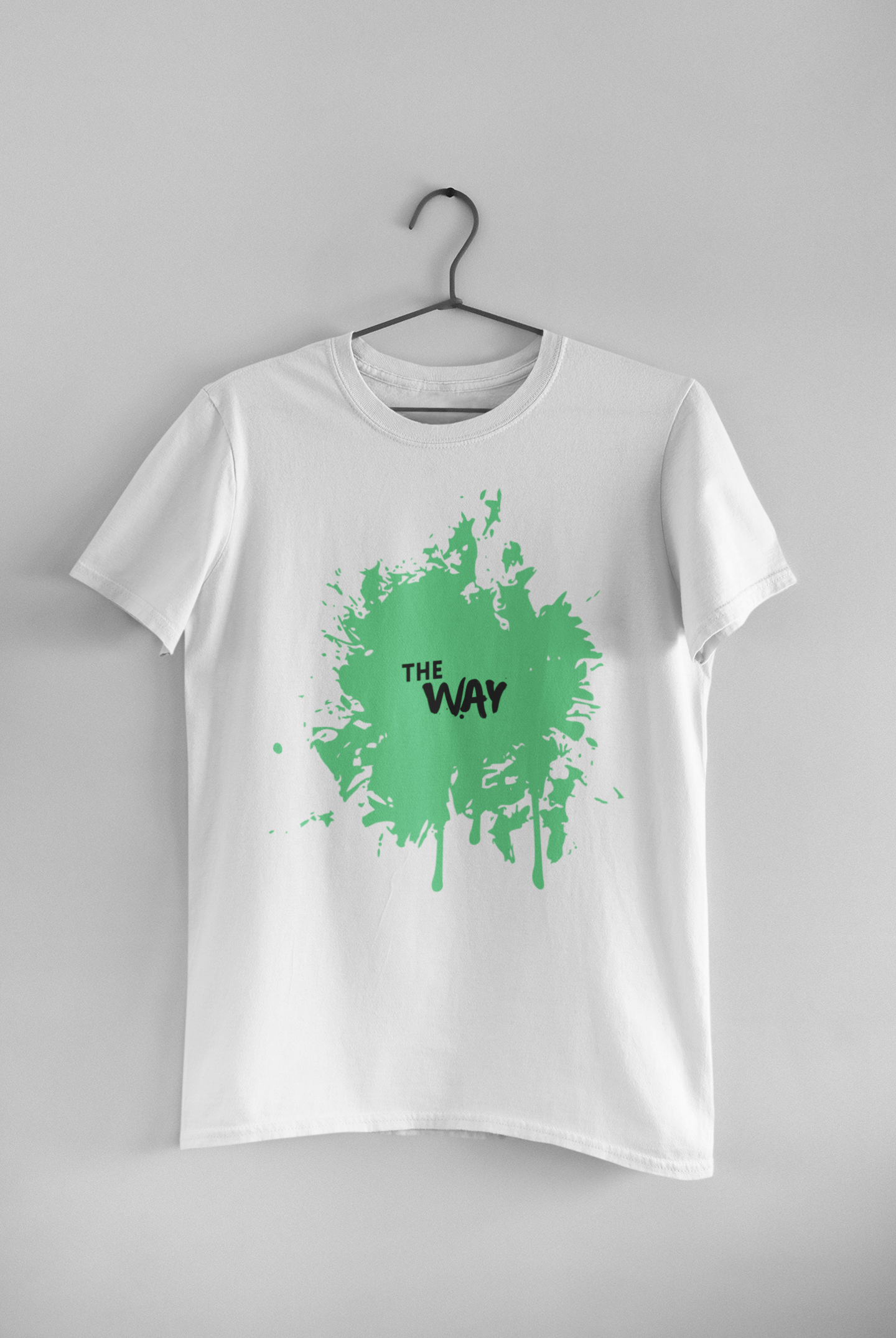 Men's white round neck t-shirt with graphic print and text "THE WAY", styled with denim jeans.